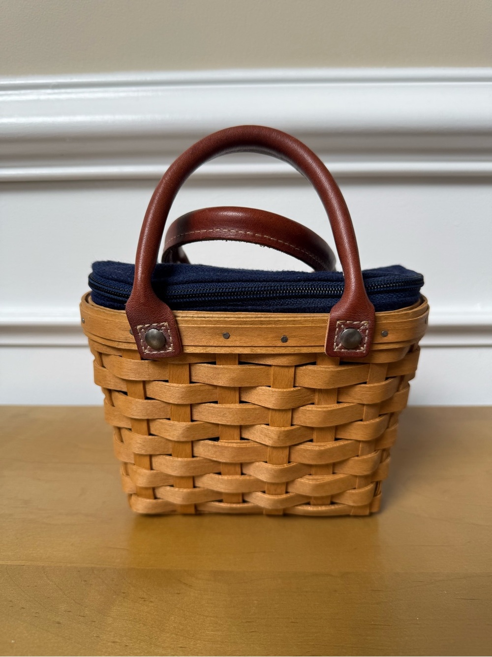Longaberger Woven Basket Tote with Navy Fabric and Brown Leather Handles